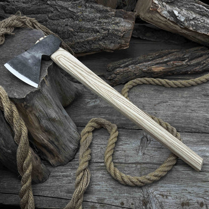 Hand-forged bushcraft hatchet with leather back sheath and ash handle
