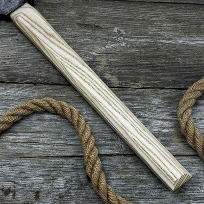 Hand-forged bushcraft hatchet with leather back sheath and ash handle