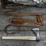 Hand-forged bushcraft hatchet with leather back sheath and ash handle