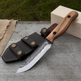 Hand-forged bushcraft knife with 10 cm blade and leather sheath by Sharky Forged Steel Tools