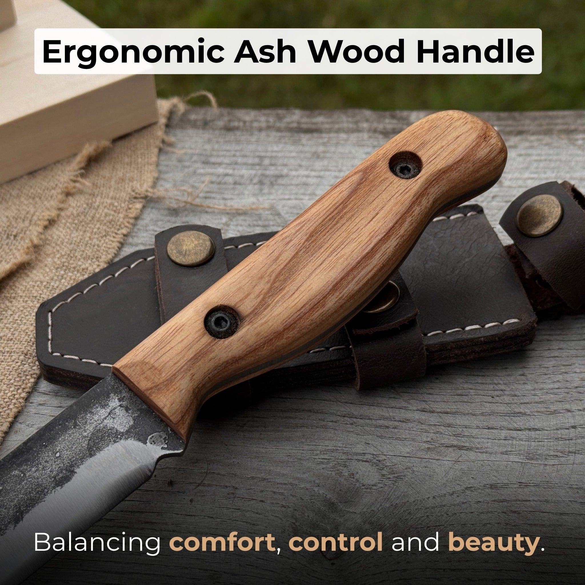 Hand-forged bushcraft knife with 10 cm blade and leather sheath by Sharky Forged Steel Tools