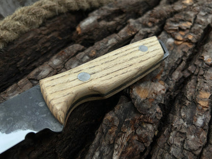Hand-Forged Bushcraft Knife with 12 cm carbon steel blade and ash wood handle by Sharky Forged Steel Tools