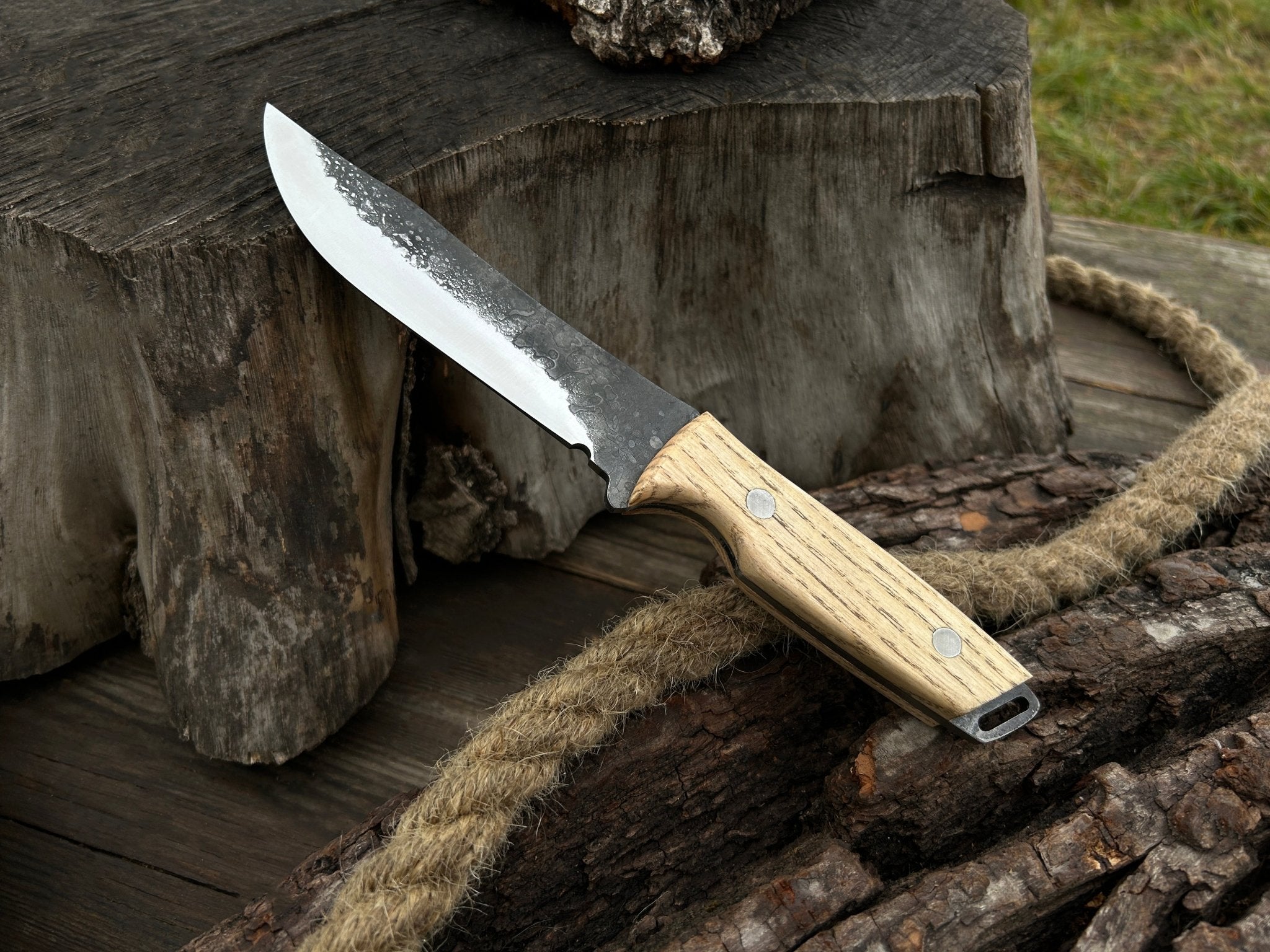 Hand-Forged Bushcraft Knife with 12 cm carbon steel blade and ash wood handle by Sharky Forged Steel Tools