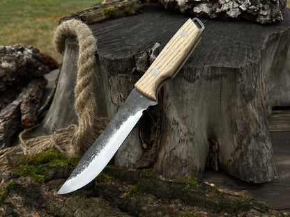 Hand-Forged Bushcraft Knife with 12 cm carbon steel blade and ash wood handle by Sharky Forged Steel Tools