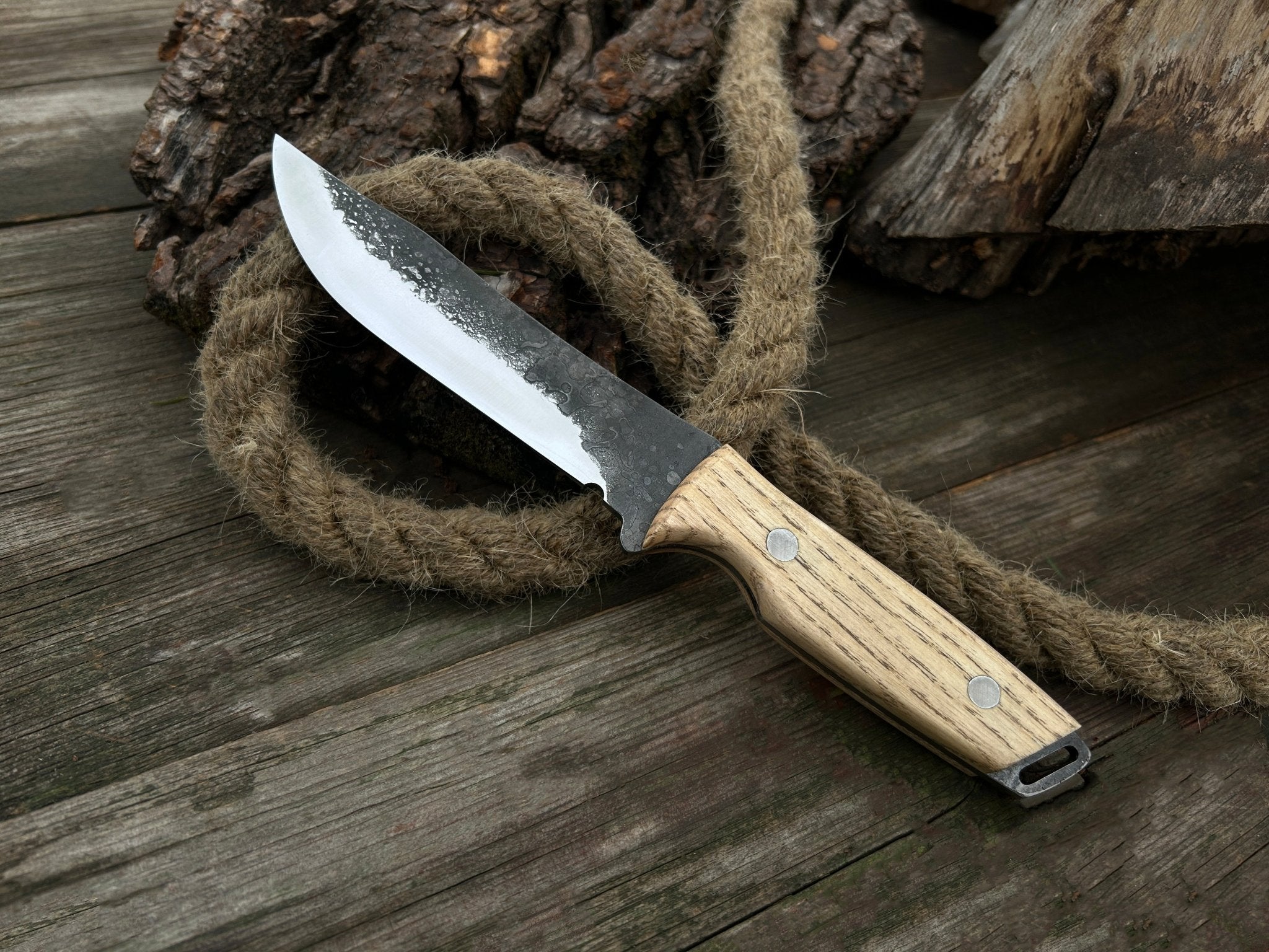 Hand-Forged Bushcraft Knife with 12 cm carbon steel blade and ash wood handle by Sharky Forged Steel Tools