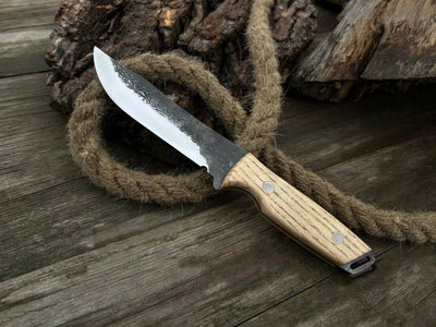 Hand-Forged Bushcraft Knife with 12 cm carbon steel blade and ash wood handle by Sharky Forged Steel Tools