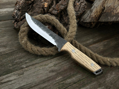 Hand-Forged Bushcraft Knife with 12 cm carbon steel blade and ash wood handle by Sharky Forged Steel Tools