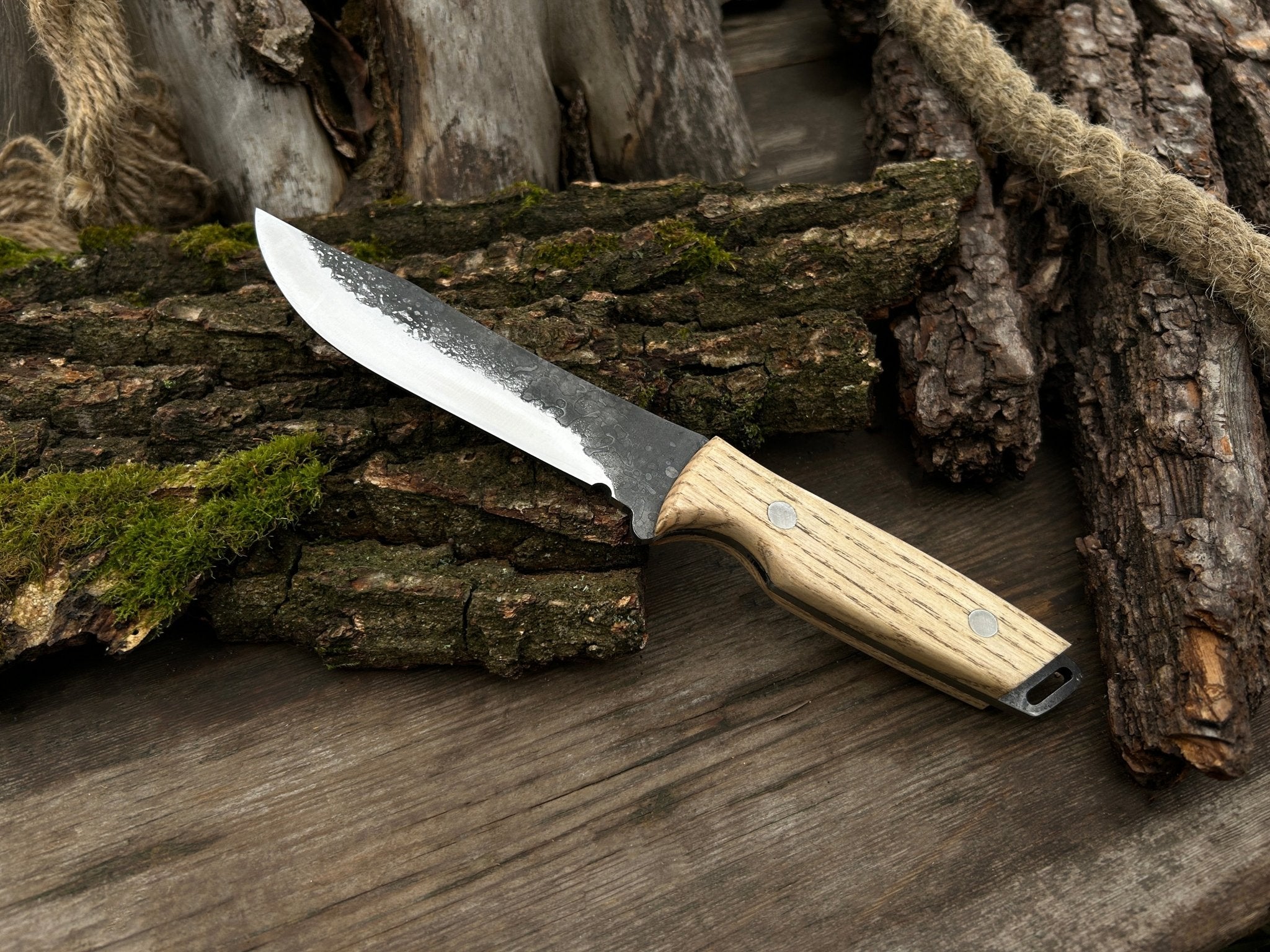Hand-Forged Bushcraft Knife with 12 cm carbon steel blade and ash wood handle by Sharky Forged Steel Tools