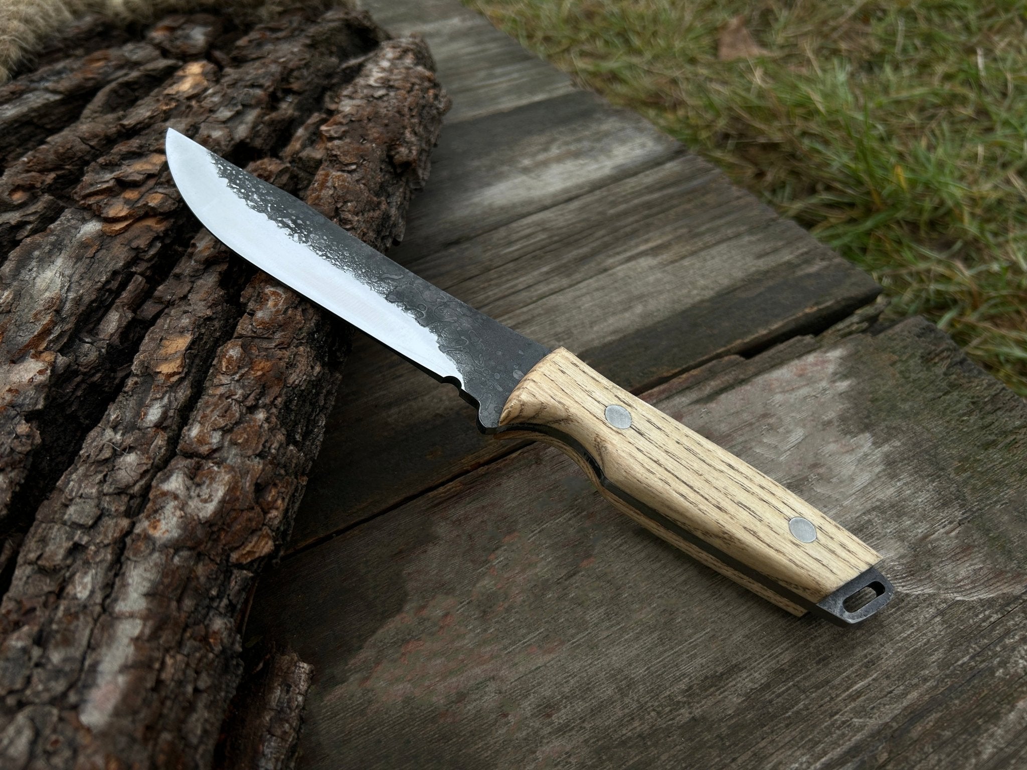 Hand-Forged Bushcraft Knife with 12 cm carbon steel blade and ash wood handle by Sharky Forged Steel Tools