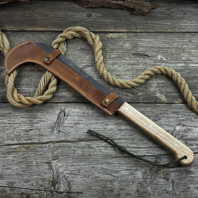 Hand-forged bushcraft knife with carbon steel blade and ash wood handle by Sharky Forged Steel Tools