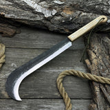 Hand-forged bushcraft knife with carbon steel blade and ash wood handle by Sharky Forged Steel Tools