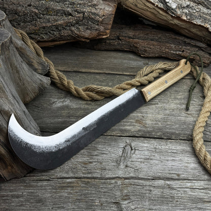 Hand-forged bushcraft knife with carbon steel blade and ash wood handle by Sharky Forged Steel Tools