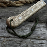 Hand-forged bushcraft knife with carbon steel blade and ash wood handle by Sharky Forged Steel Tools