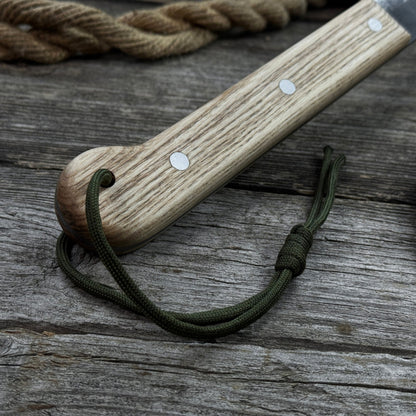 Hand-forged bushcraft knife with carbon steel blade and ash wood handle by Sharky Forged Steel Tools
