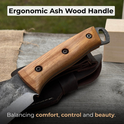Hand-forged camping knife with 12.5 cm carbon steel blade and ash wood handle, with leather sheath