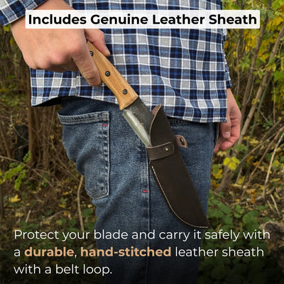 Hand-forged camping knife with 12.5 cm carbon steel blade and ash wood handle, with leather sheath