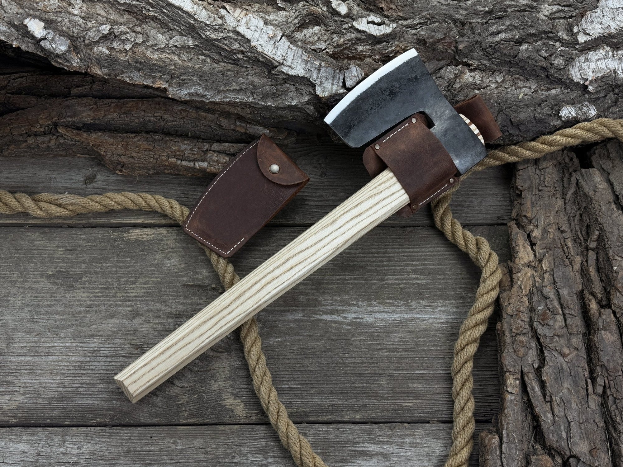 Hand-forged carpenter's axe with belt loop and leather sheath