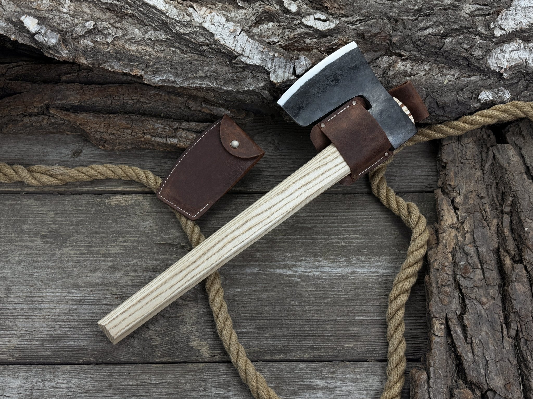 Hand-forged carpenter's axe with belt loop and leather sheath