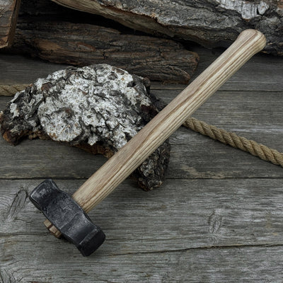 Hand-forged double blacksmith's hammer with ash wood handle and carbon steel head