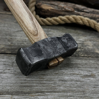 Hand-forged double blacksmith's hammer with ash wood handle and carbon steel head