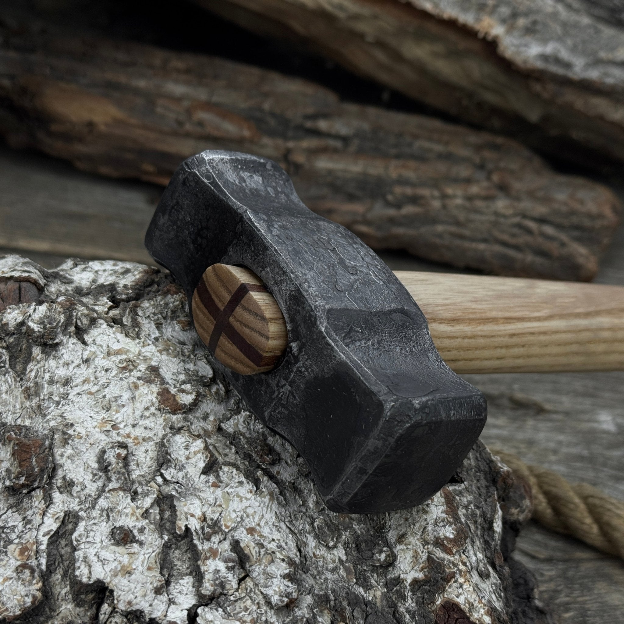 Hand-forged double blacksmith's hammer with ash wood handle and carbon steel head