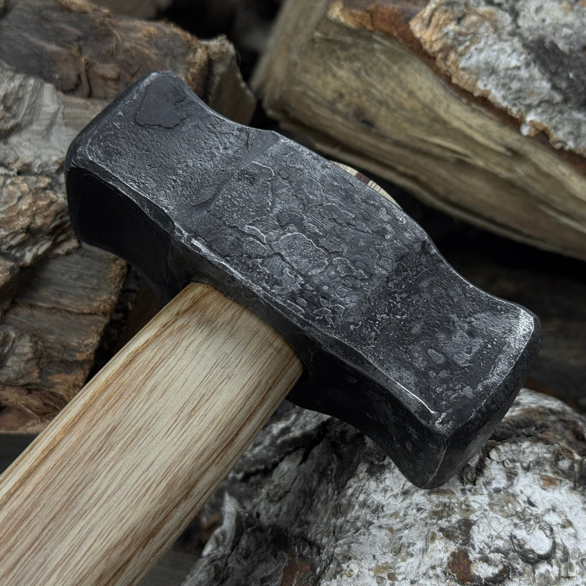 Hand-forged double blacksmith's hammer with ash wood handle and carbon steel head