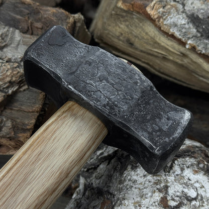 Hand-forged double blacksmith's hammer with ash wood handle and carbon steel head
