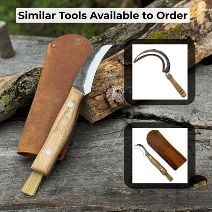 Hand-forged mushroom foraging knife with carbon steel blade, ash wood handle, built-in brush, and leather sheath