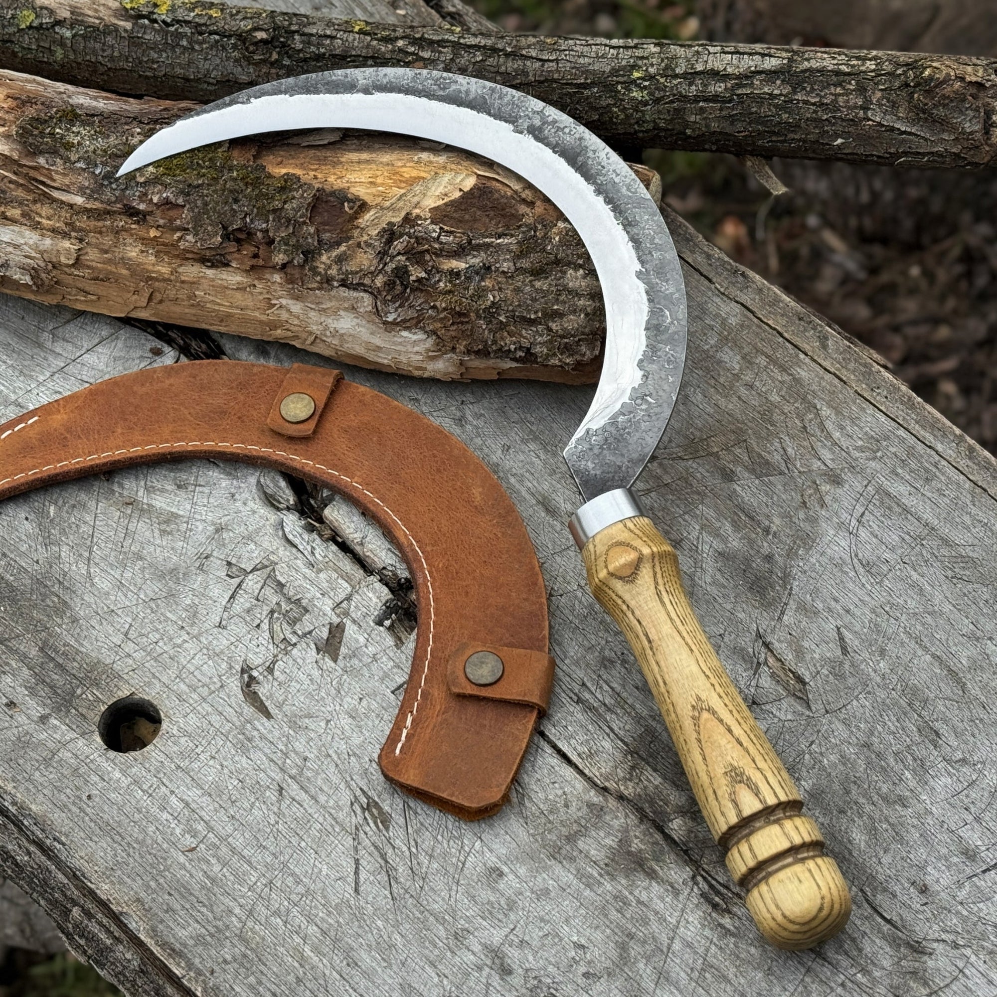 Hand-forged large sickle with 19 cm carbon steel blade and ash wood handle