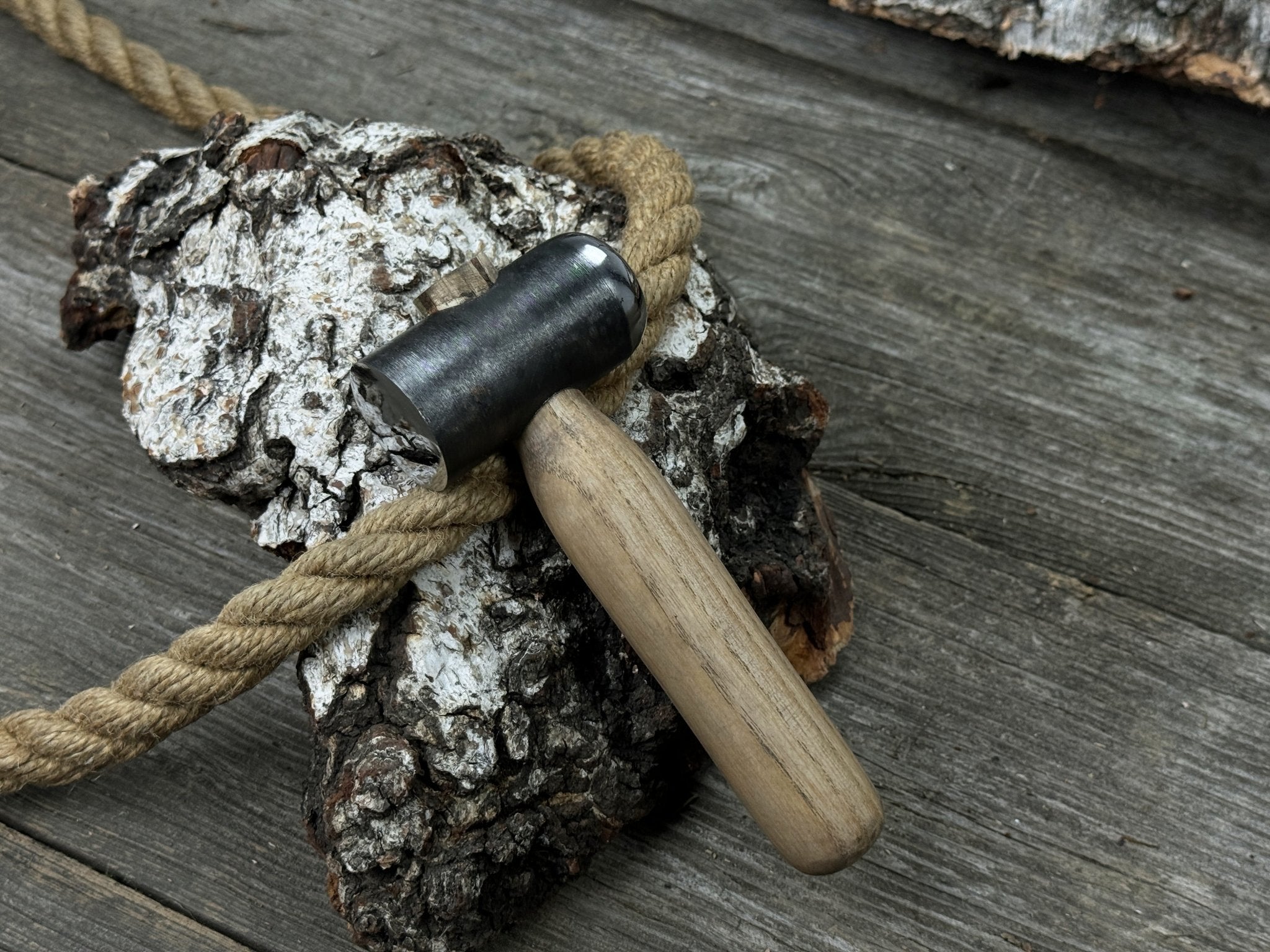 Hand-forged leather hammer with carbon steel head and ash wood handle