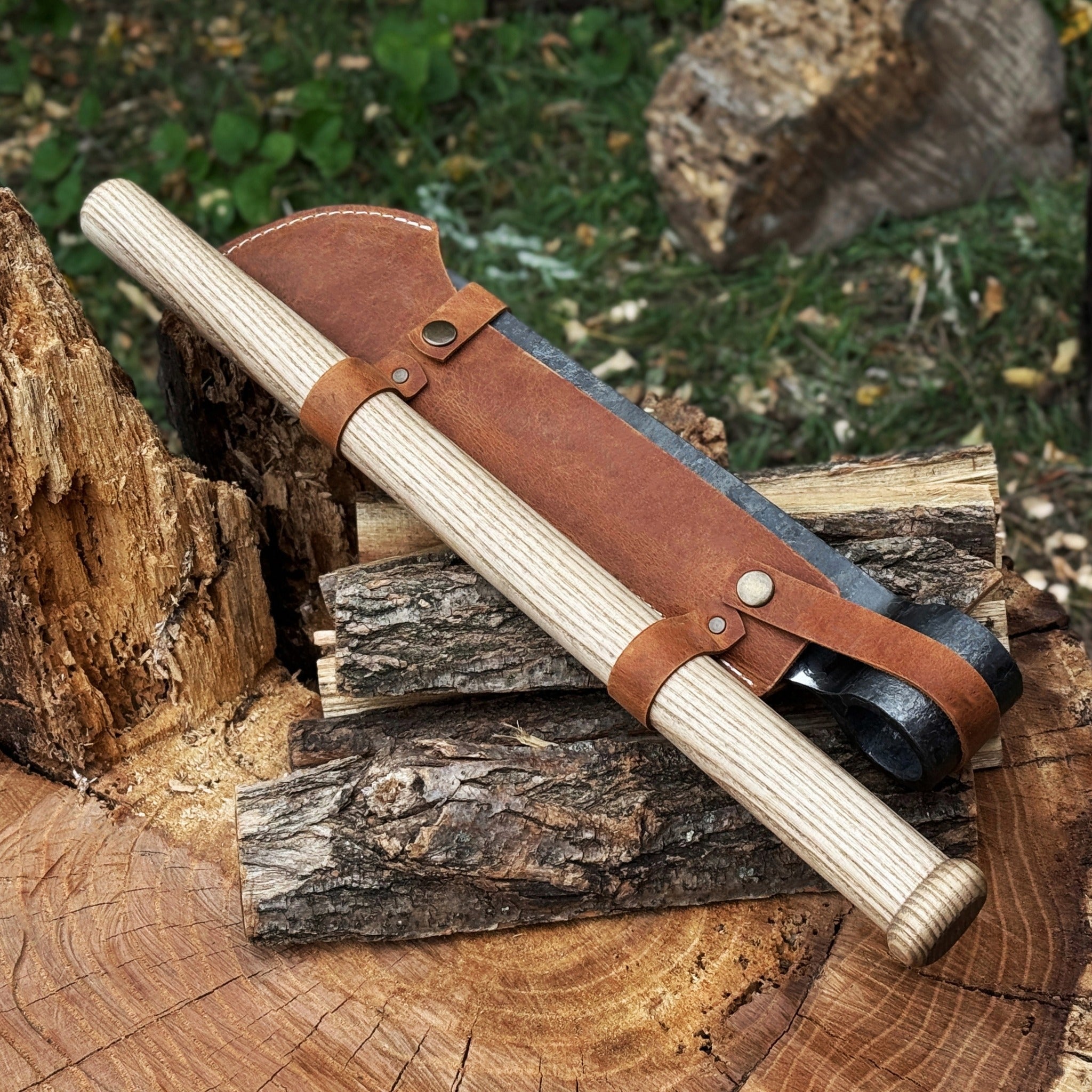 Hand-forged splitting froe with ash wood handle and leather sheath