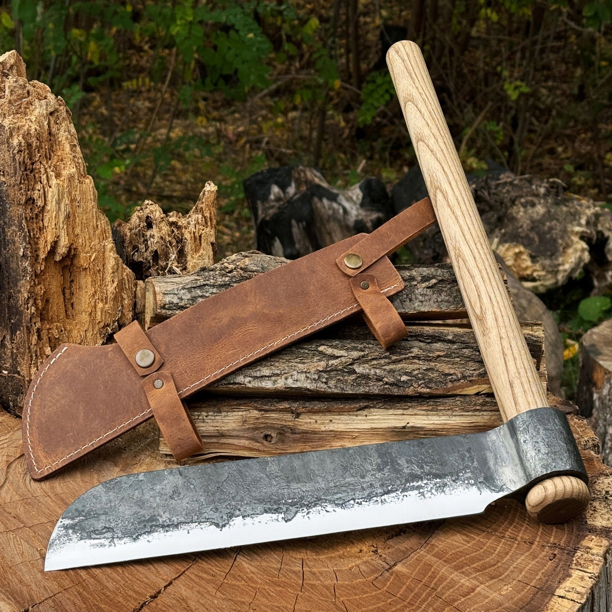 Hand-forged splitting froe with ash wood handle and leather sheath