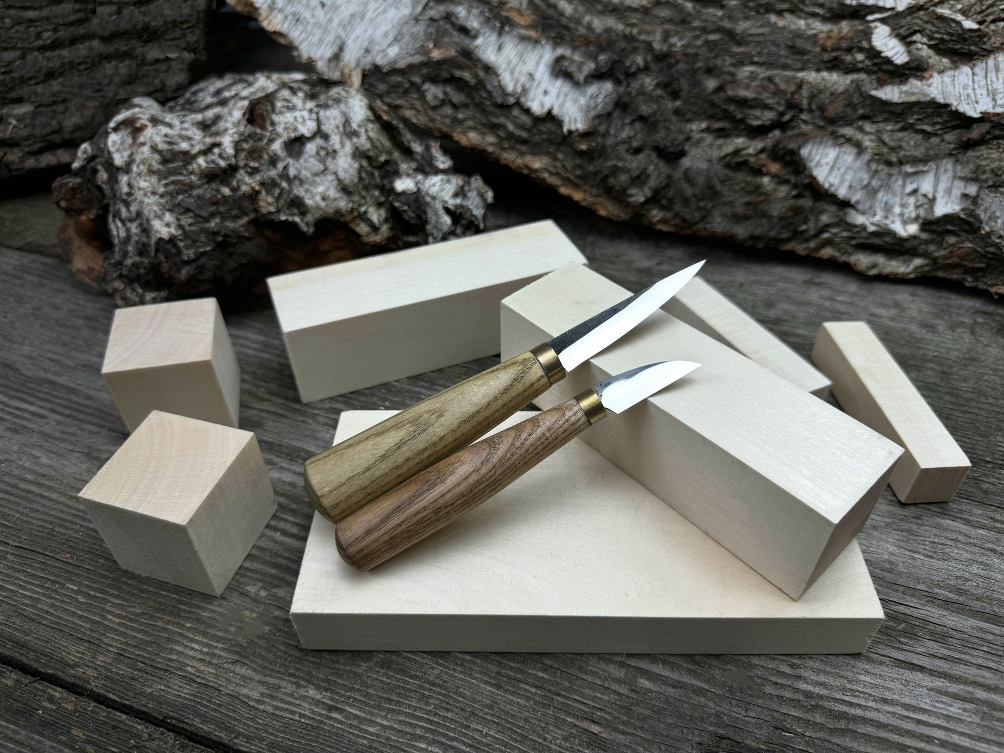Hand-forged wood carving tool set with two knives and wooden blanks