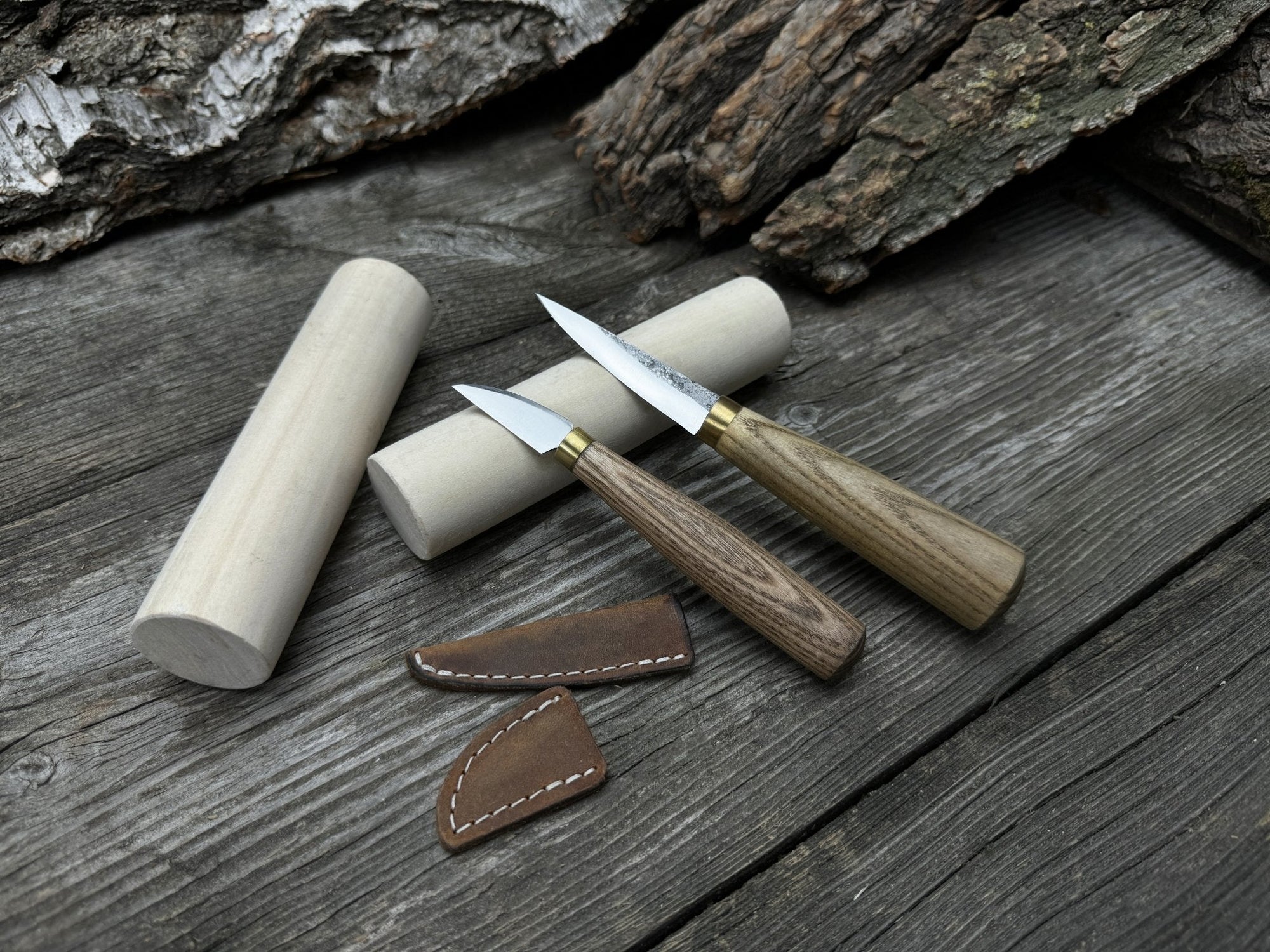 Hand-forged wood carving tool set with two knives and wooden blanks by Sharky Forged Steel Tools