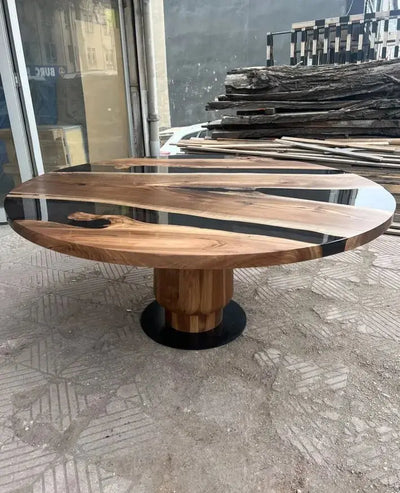 Round epoxy resin dining table with walnut wooden tulip base