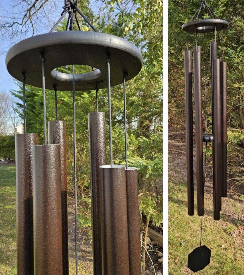 Amish handmade aluminum wind chimes in various sizes hanging outdoors