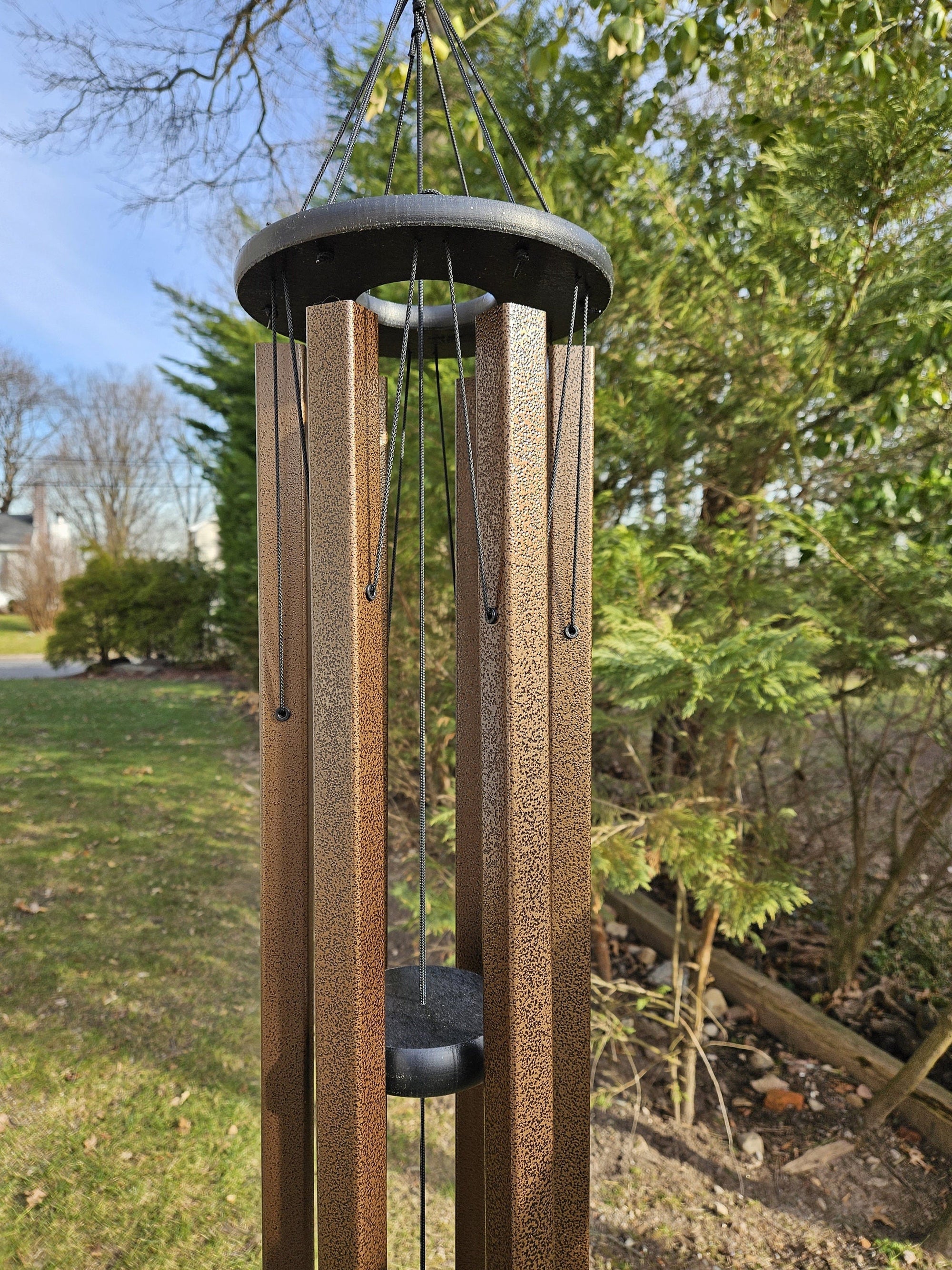 Amish handmade square aluminum wind chimes in outdoor garden setting