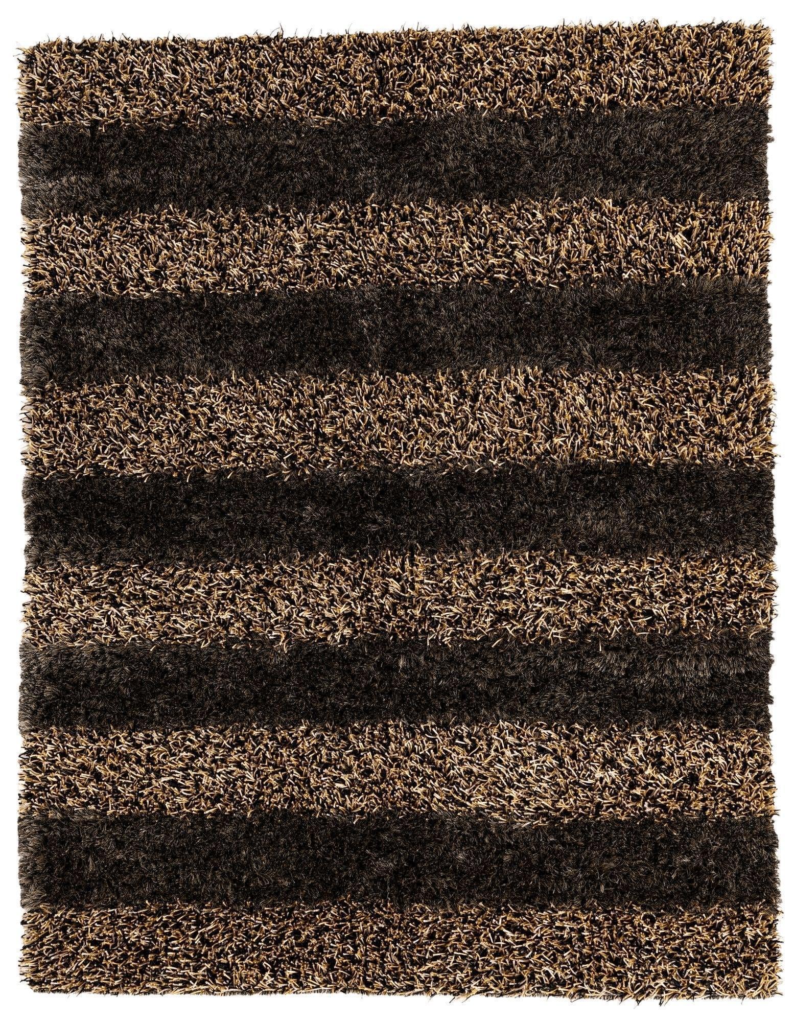 Handwoven Multi-Tone Shag Rug in a living room setting showing multi-color tones and fringed edges