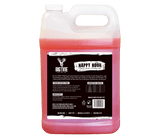 Clear plastic jug with red liquid labeled Big Tine Happy Hour liquid deer attractant and feeding information on a black and white label.