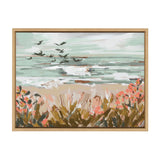 Framed canvas painting of a beach landscape with a flock of birds in flight over the ocean, featuring pastel blues, greens, and coral-hued wildflowers in the foreground.