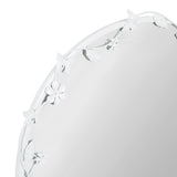 Curved silver metal frame with intricate floral and butterfly decorations around an oval wall mirror.