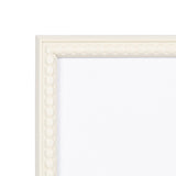 Close-up of the top-left corner of a white photo frame with rounded bead-like detailing along the inner edge.