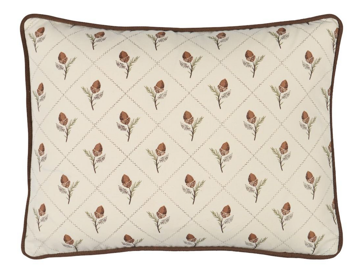 Cream rectangular pillow cover featuring a repeating pattern of brown pinecone-like motifs with green stems, framed by brown piping along the edges.