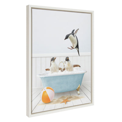 Framed canvas art featuring three penguins enjoying a bath in a beach house setting, printed and framed with a polystyrene frame.