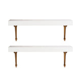 Two minimalist white rectangular floating shelves each supported by a pair of ornate bronze-colored metal brackets, shown against a white background.