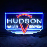 Hudson Sales Service Neon Sign Light showing glowing blue neon letters on acrylic printed backing hung indoors.