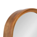 Close-up of a round arch mirror with a thick, warm-toned wooden frame showing natural grain and smooth finish, reflecting a plain background.