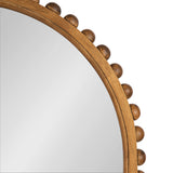 Close-up of an arched wooden wall mirror frame featuring evenly spaced round wooden beads along the outer edge with a warm brown finish.