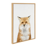 Portrait of a red fox with fluffy white chest fur, set against a plain white background, framed in a light wood frame.