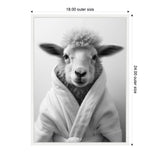 Black and white portrait of a sheep facing forward wearing a plush robe against a plain background, framed in white with dimensions labeled.